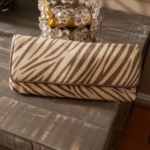 Grey and cream zebra striped clutch